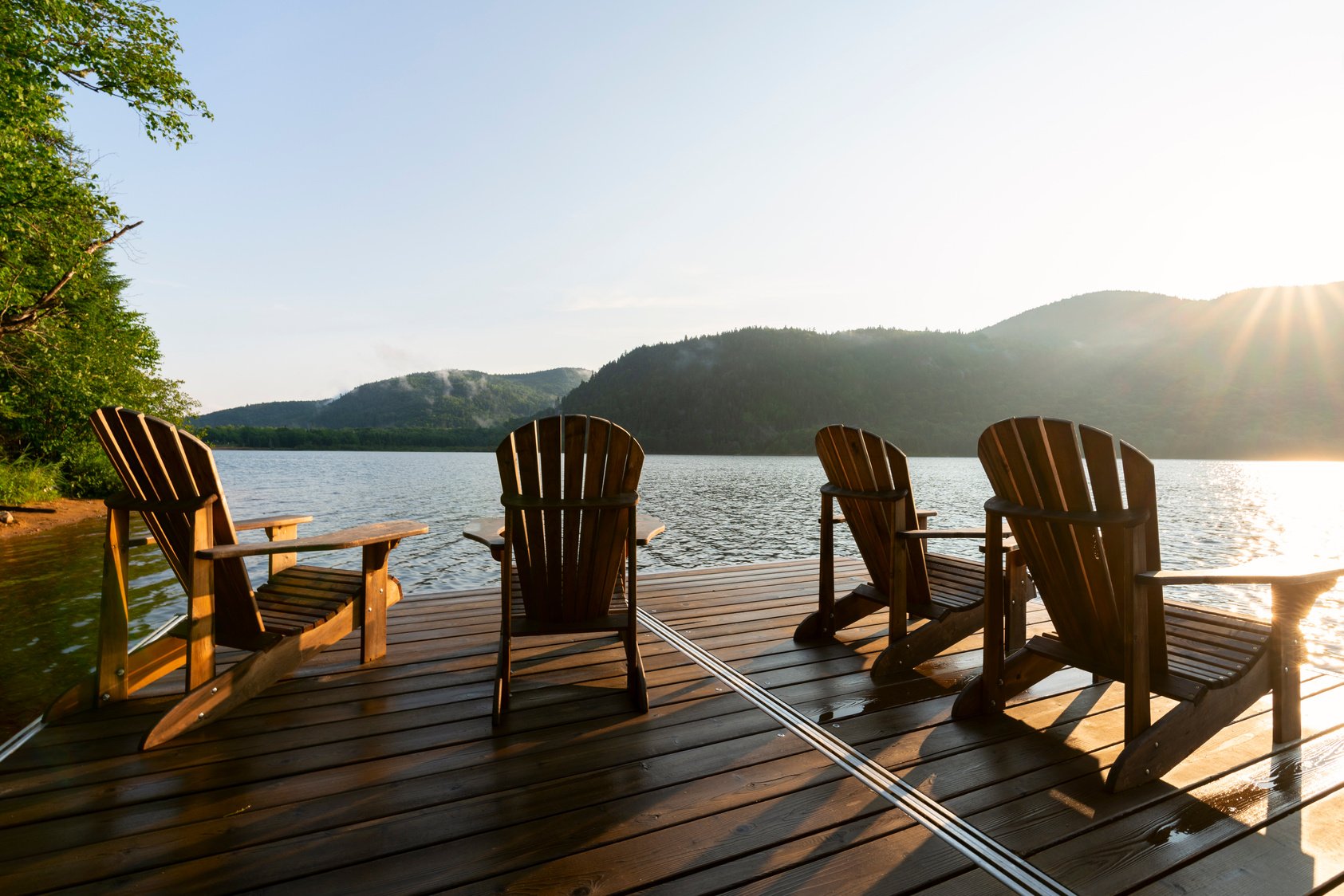 Adirondack deck chairs on lake dock